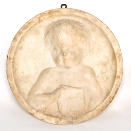 Medallion of a Young Boy Holding an Armorial Device