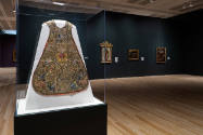 Installation view of "Painted Cloth: Fashion and Ritual in Colonial Latin America," Blanton Mus…