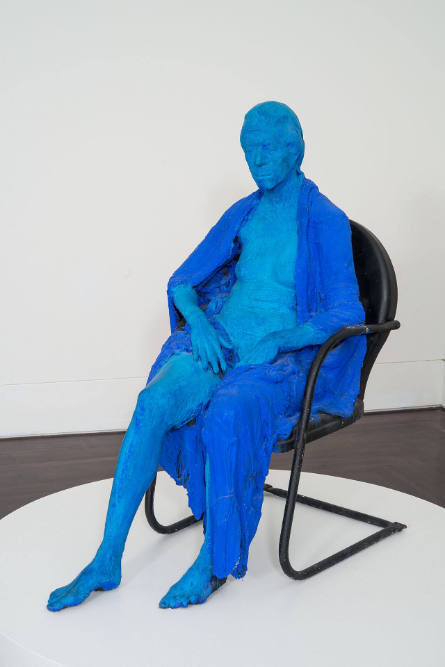 Blue Woman in Black Chair