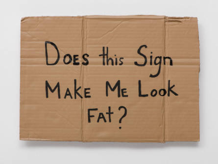 Does this Sign Make me Look Fat [Me hace parecer gordo este signo]